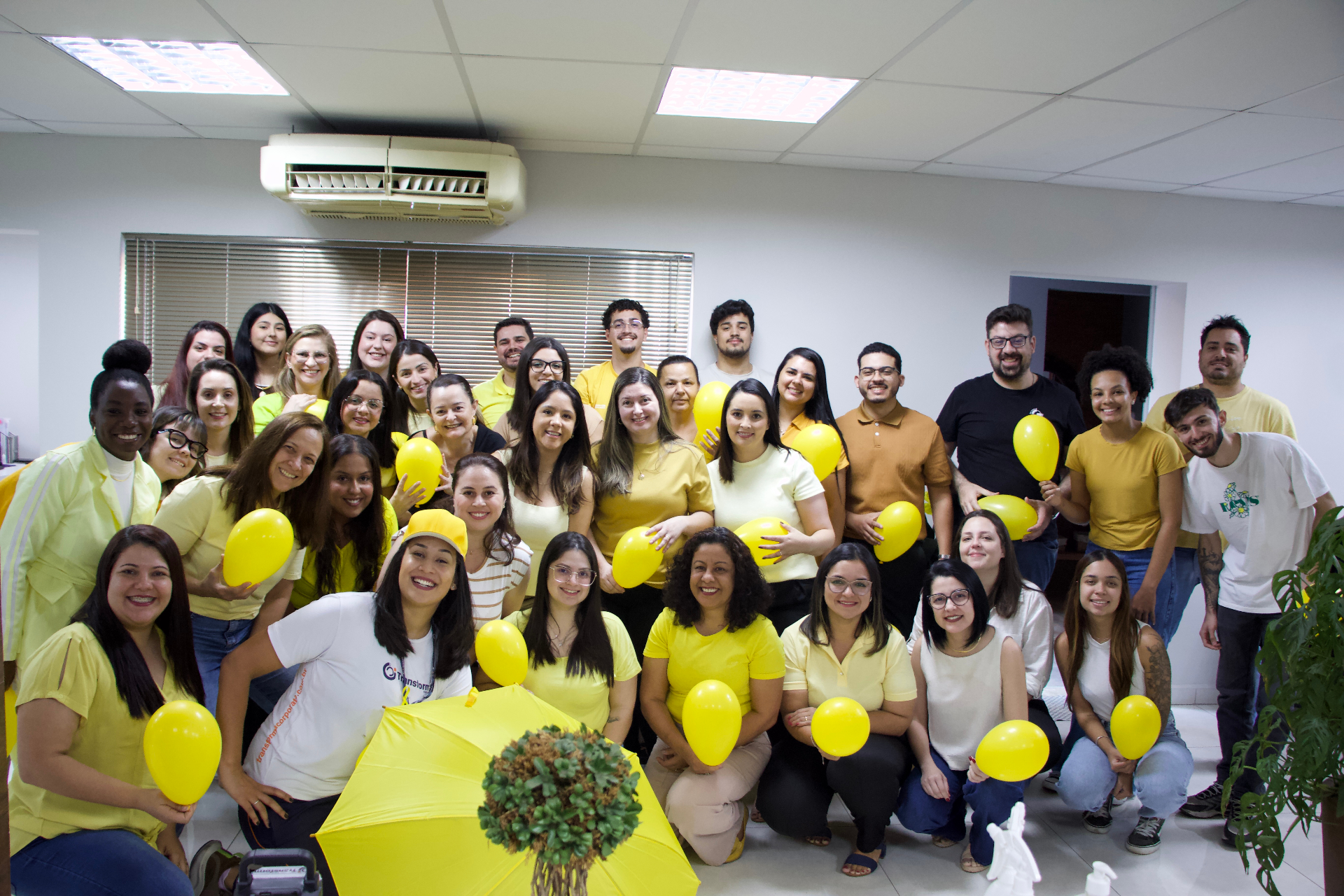 Time GLIP em ação amarela — campanha institucional